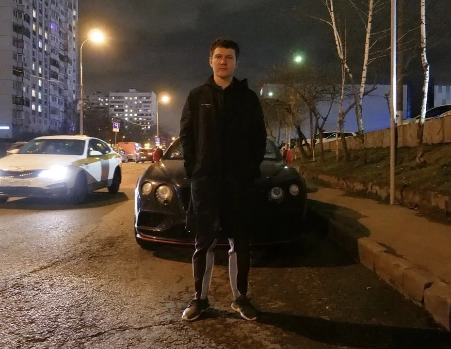 Dale Stiffler at night with luxury car - lifestyle shot